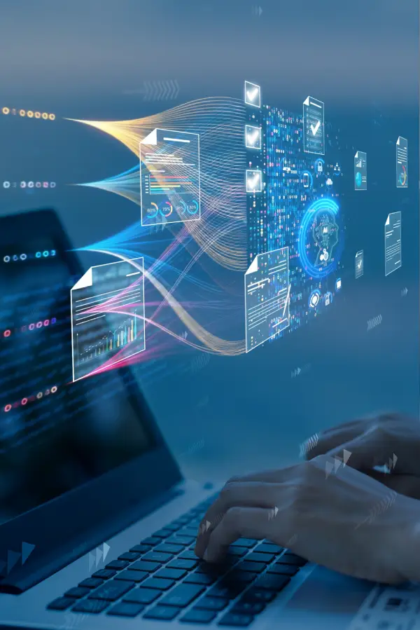 A person typing on a laptop with digital data streams and document icons flowing across the screen